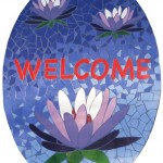 mosaic welcome sign with Lillies on a pond