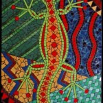 Surreal gecko in ceramic mosaic wandering through brightly coloured patterns