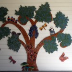 wisdom tree and lots of wildlife in a ceramic mosaic mural